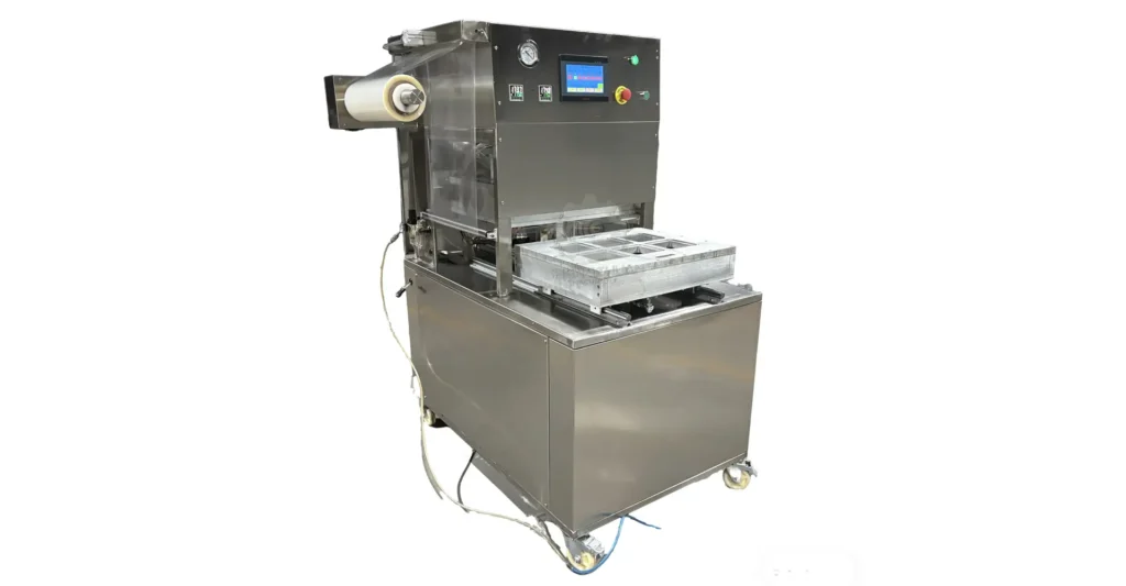 Food tray sealing machine